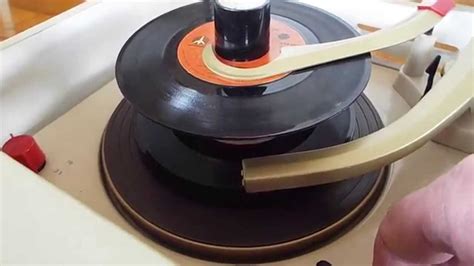 V M 1290 Automatic Record Player Playing A Stack Of 45 Records Youtube