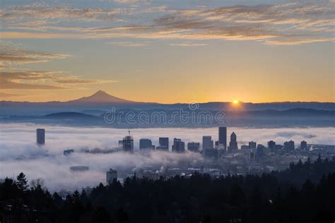 Sunrise Over Foggy Portland Cityscape With Mt Hood Stock Photo Image
