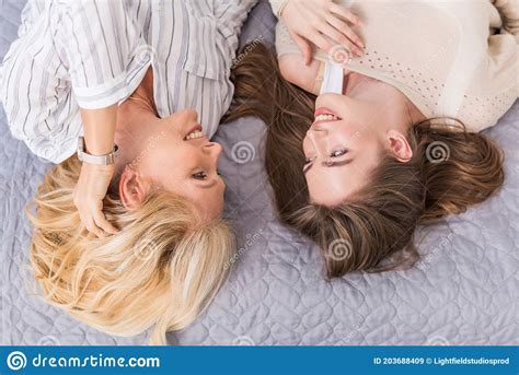 Overhead View Of Mother And Daughter Stock Image Image Of Casual