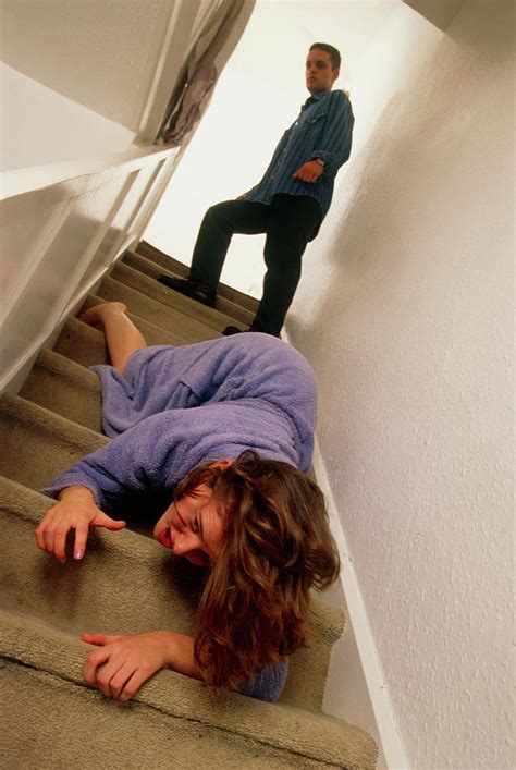 Woman Being Pushed Downstairs By Her Partner Photograph By Jim Varney Science Photo Library