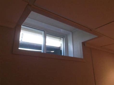 Suspended ceiling tiles, also called drop ceilings, are also popular because they help conceal structural damage. These basement windows are trimmed out into the ceiling ...