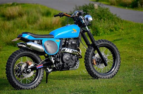 Vari interventi eseguiti, tra cui: honda nx650 dominator streettracker project.: True Blue No 7.