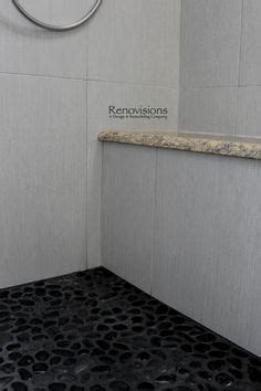 Pebble mosaic mosaic tiles stone shower floor bath tiles pebble stone website design inspiration tiny house on wheels blue and white farmhouse ideas. black pebble shower floor dark grout | bathroom | Pebble ...