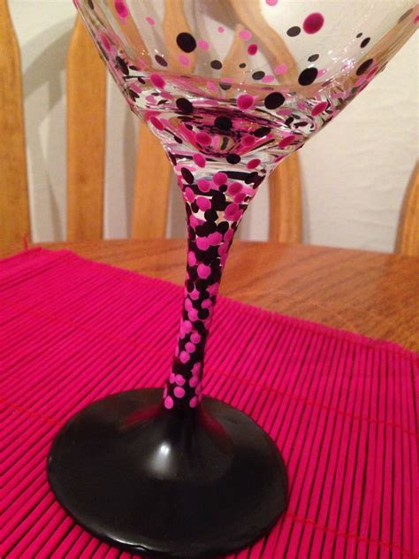 Closeup Of Two Chalkboard Paint Dipped Wine Glasses With Pink And Black Polka Dots Hand Painted