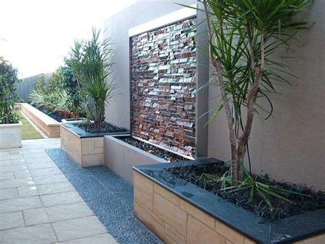 A fountain garden can also fill an empty corner in your landscape, ornament a plain wall, or disguise a view. Garden Design Ideas - Get Inspired by photos of Gardens ...