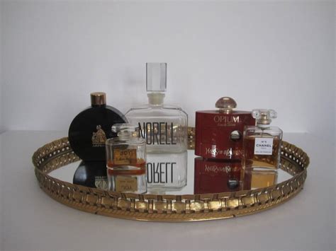 Lighted art deco style vanity mirror or wall mirror a delightful vanity or wall mirror featuring multicolored buttons and a faux. Beautiful Vintage Oval Brass and Mirror Vanity Tray at 1stdibs