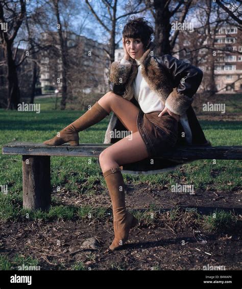Una Stubbs Actress Sitting On A Bench Hand At Face Stock Photo Alamy