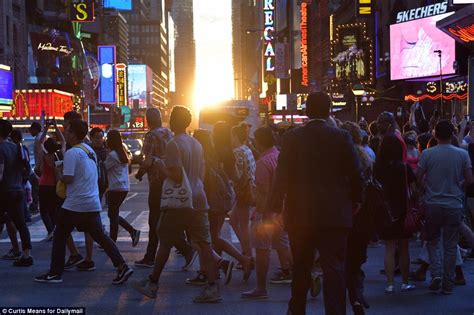 Manhattanhenge Sets The City Alight As New Yorkers Gather To Marvel At