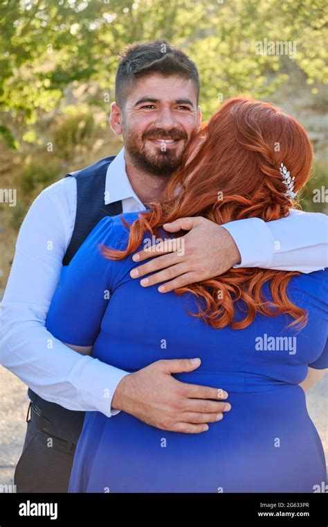 Man Hugs His Beloved Woman Smiling Stock Photo Alamy