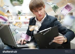 Young Man Earning Money Online Stock Photo 101809126 : Shutterstock