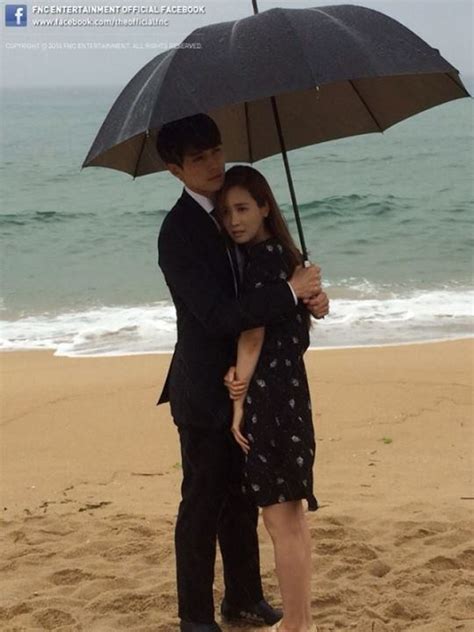 lee dong wook shows his manners by sharing an umbrella with hotel king co star lee da hae soompi