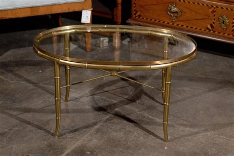 Clear/gray large oval glass coffee table set by furniture of america cherlize 34 in. Oval Brass Glass Top Cocktail or Coffee Table at 1stdibs