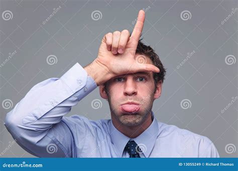 Man Sticking His Tongue Out And Gesturing Loser Stock Image Image Of