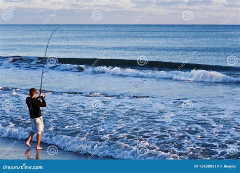 Surf Fishing On An Ocean Beach Editorial Stock Image Image Of Beach