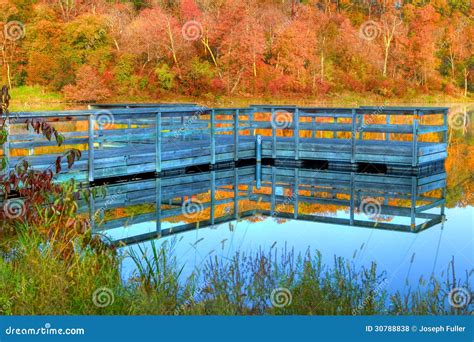 High Dynamic Range Of A Boat Dock And Fall Colors Stock Photo Image