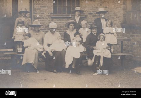 Vintage Photographic Postcard Showing Mothers And Possibly Grandmothers