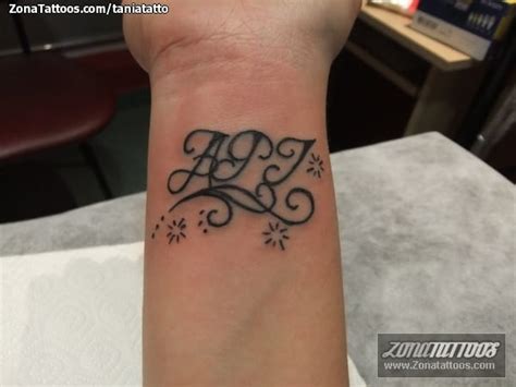 Tattoo Of Letters Initials Wrist