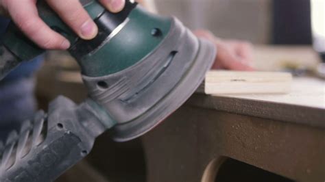 Worker Grinds The Wood Of Angular Grinding Machine Stock Video Footage