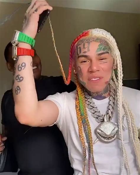 tekashi 6ix9ine gets signature hair dyed a new shade of rainbow check it out