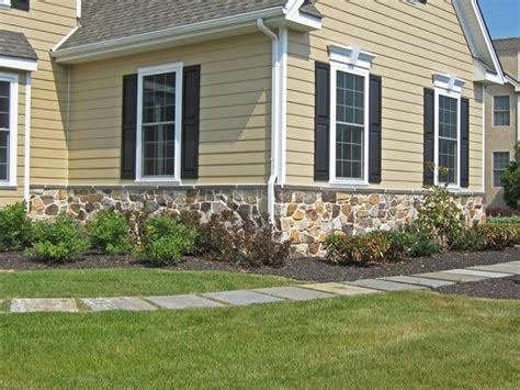Realistic, affordable, easy and lightweight. Vinyl Siding And Stone Combination http://www ...