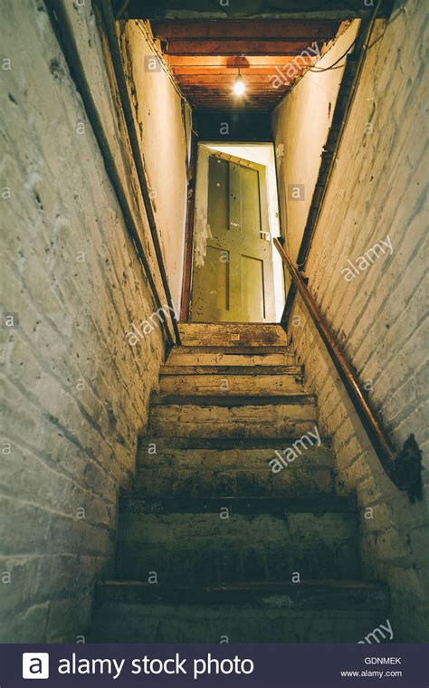 Ck 3316621 the basement door was broken. Cellar steps up to open door Stock Photo, Royalty Free Image: 111729819 - Alamy