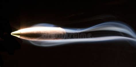 Speeding Bullet Stock Image Image Of Orange Ammo Black 12795947