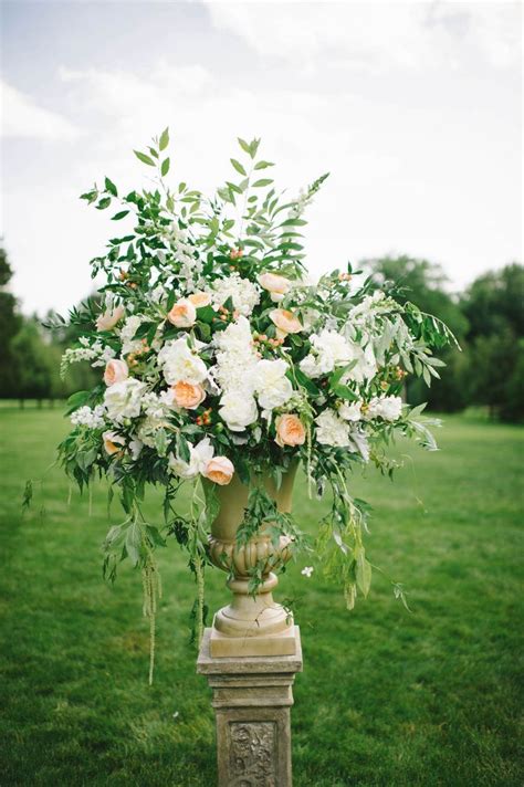 All flower types · inspirational designs · impeccable service large urn floral arrangement perfect for a wedding ...