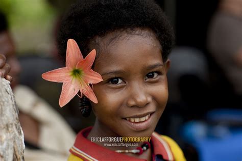 ERIC LAFFORGUE PHOTOGRAPHY Smiling Girl With Flowers In The Hair