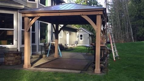 They can also be referred to as gazebos, though that distinction is usually left to smaller and more. Cedar Wood Gazebo With Aluminum Roof 12x12 - Pergola ...