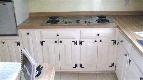 Shop cabinet hinges for all your project needs. White Cabinets with Dark Cabinet Hardware and Cabinet ...