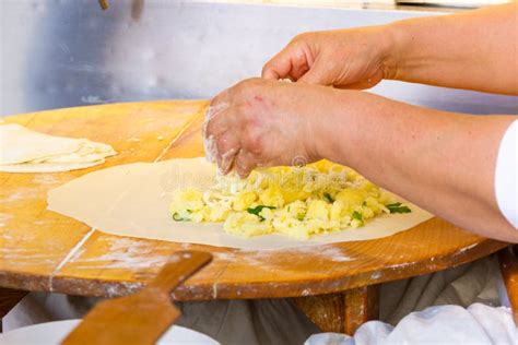 Hands Of Cook Preparing Potato And Cheese Gozleme Stock Image Image