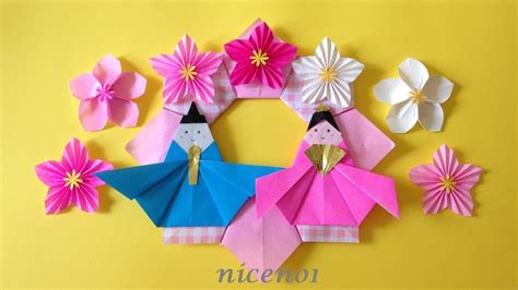 The kami changes to gami as an instance of rendaku (連濁). 折り紙 雛人形のリースの簡単な作り方 Origami Japanese Kimono Doll