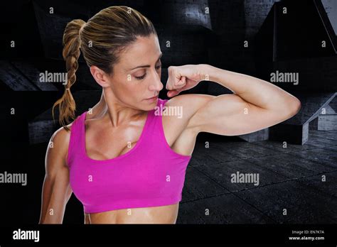 Composite Image Of Female Bodybuilder Flexing Bicep In Pink Sports Bra