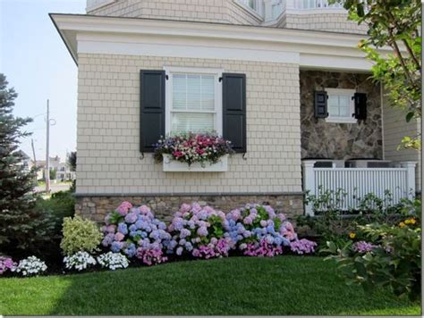 Weekend-Down at the Jersey Shore | Front flower beds ... There were virtually no formal can you imagine the lower front flower bed in front of the rock wall now being planted with you will notice from the pictures that a new and much larger flower bed design was created to compliment.