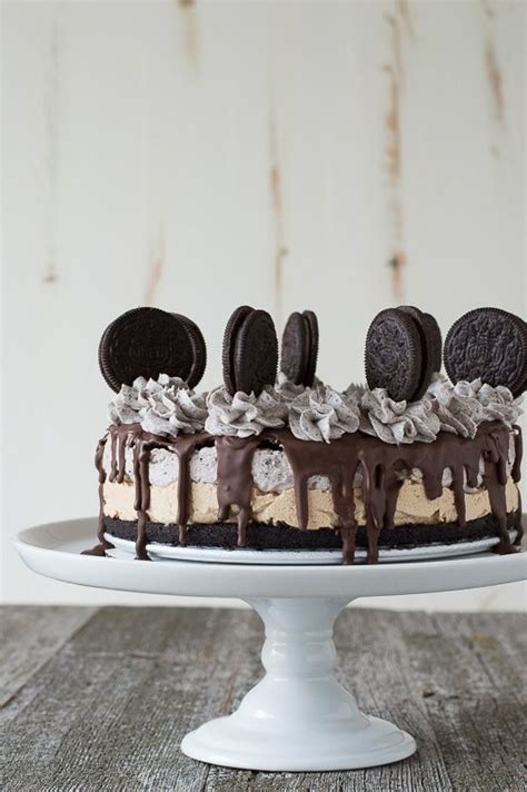 Drizzle fudge topping over ice cream; Frozen Oreo Peanut Butter Cake - a delicious frozen cake ...