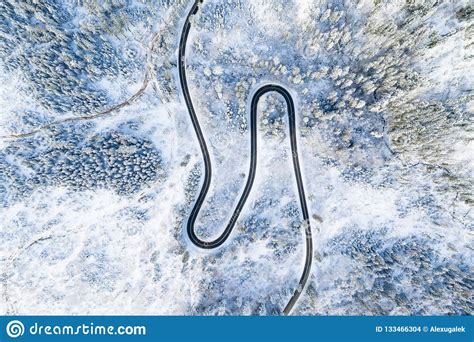 Road In The Winter Forest Aerial View Winding Road Without Cars In The