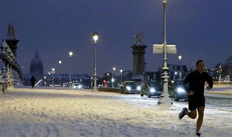Snow In Paris Eiffel Tower Closed As Weather Freezes France Today
