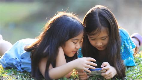 Asian Girls Playing Game On Smart Stock Footage Video 100 Royalty