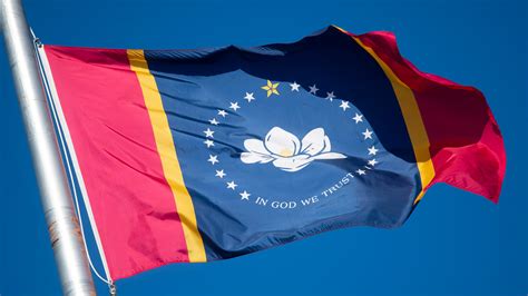 Mississippi governor signs law for new state flag without rebel sign