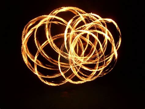 Fire Poi Which Is Performed On The Midway Before Patrons Get To The