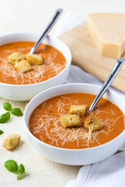 Add reserved tomato liquid and chicken broth. Creamy Tomato Basil Soup | The Blond Cook