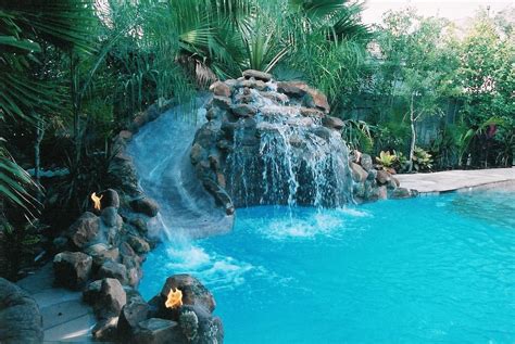 Stunning backyard beach pool design ideas. backyard Pool with water slide | Pool waterfall, Beautiful ...