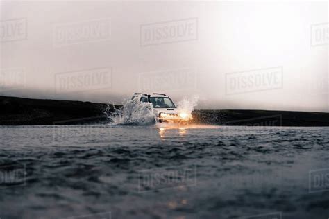 Off Road Vehicle Driving In River Landmannalaugar Iceland Stock