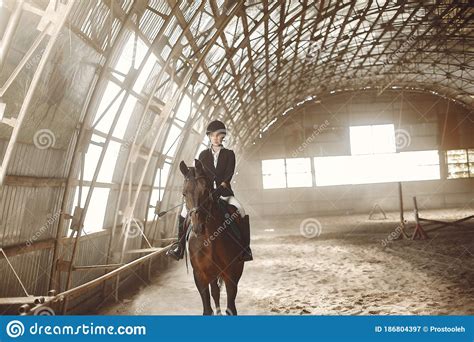 The Rider In Black Form Trains With The Horse Stock Image Image Of