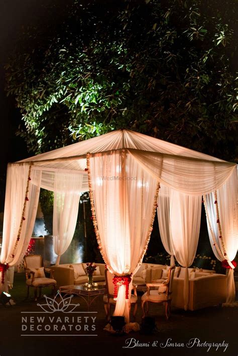 Select from premium white canopy of the highest quality. sPhoto of Romantic night decor with white canopies | White ...
