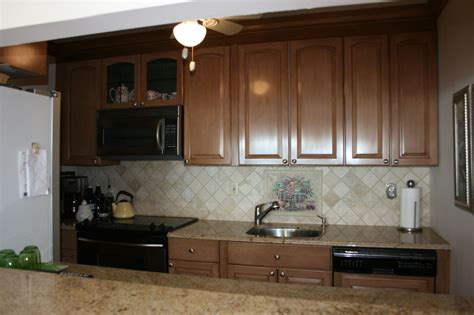 Don't buy new cabinets when the old ones are still in good. painting kitchen cabinets with airless sprayer best ...