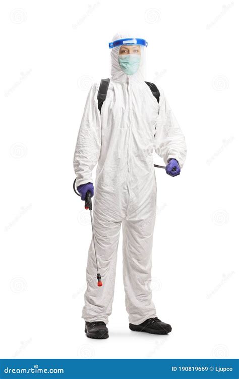 Woman In A Hazmat Suit With Protective Equipment For Disinfection Stock