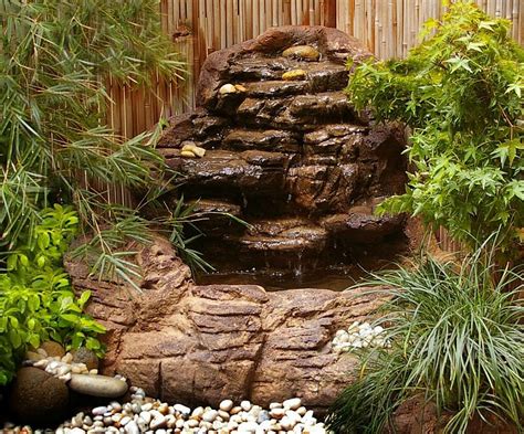 You can do the job manually with a garden. Small Backyard Corner Pond Waterfalls Kits & Artificial Rocks
