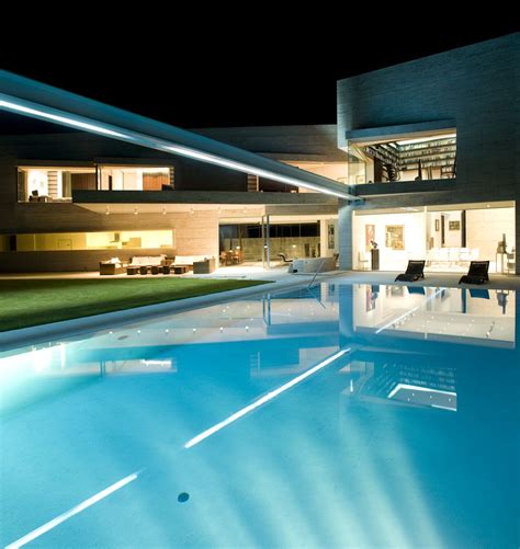 A Cero Projects Modern Houses Tennis Court Tropical Pool