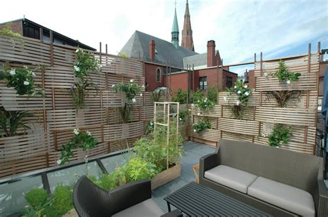 Lattice ideas can also give some protection from wind and also act as a support for climbing plants if you. Roof deck, Woven cedar lattice screen with built in ...